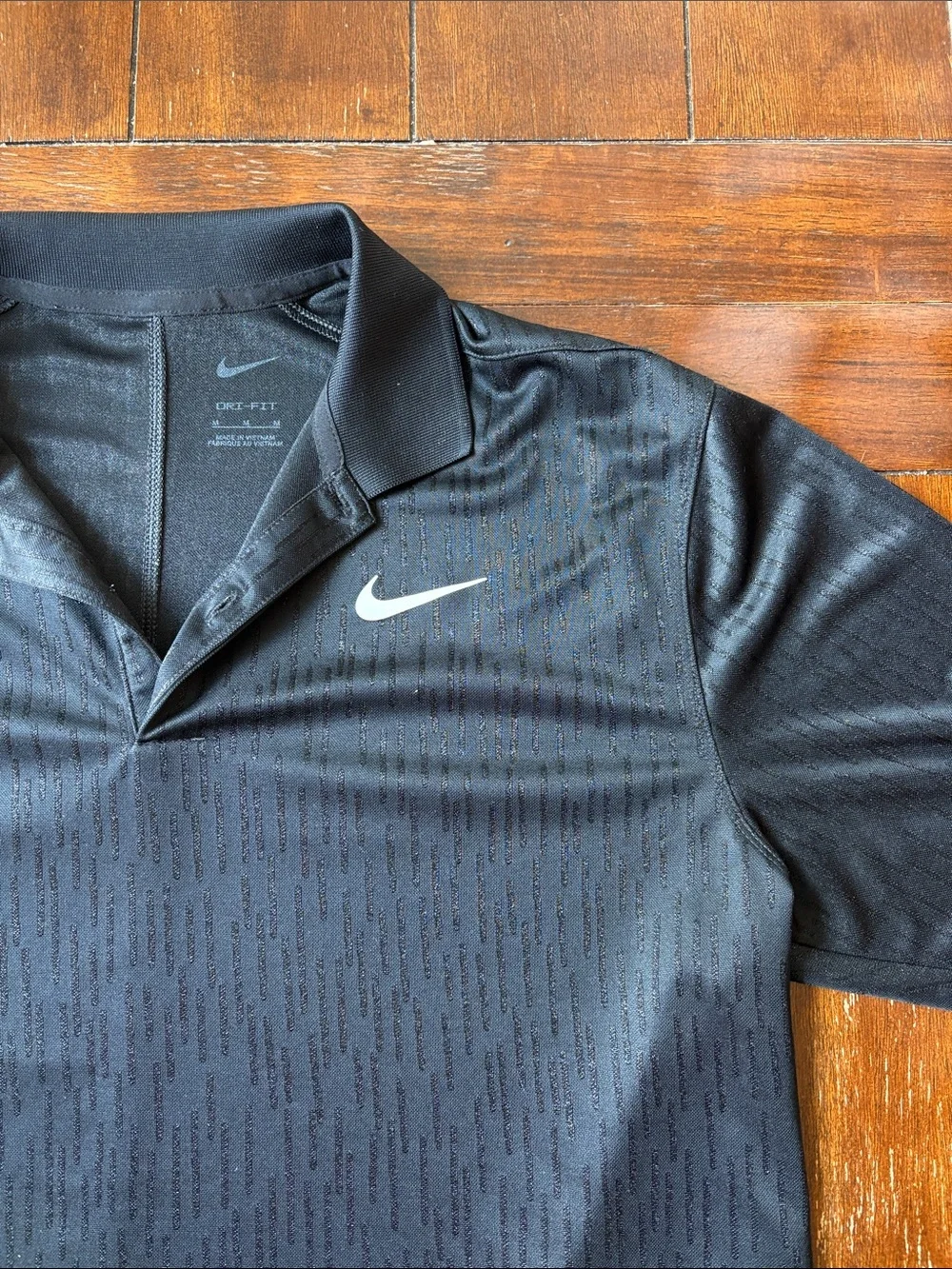 Nike Black Short-Sleeve Performance Polo with White Swoosh